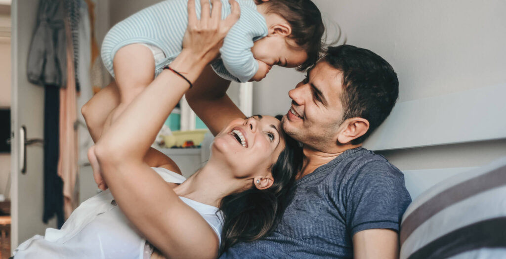 A joyful family enjoys quality time together at home.